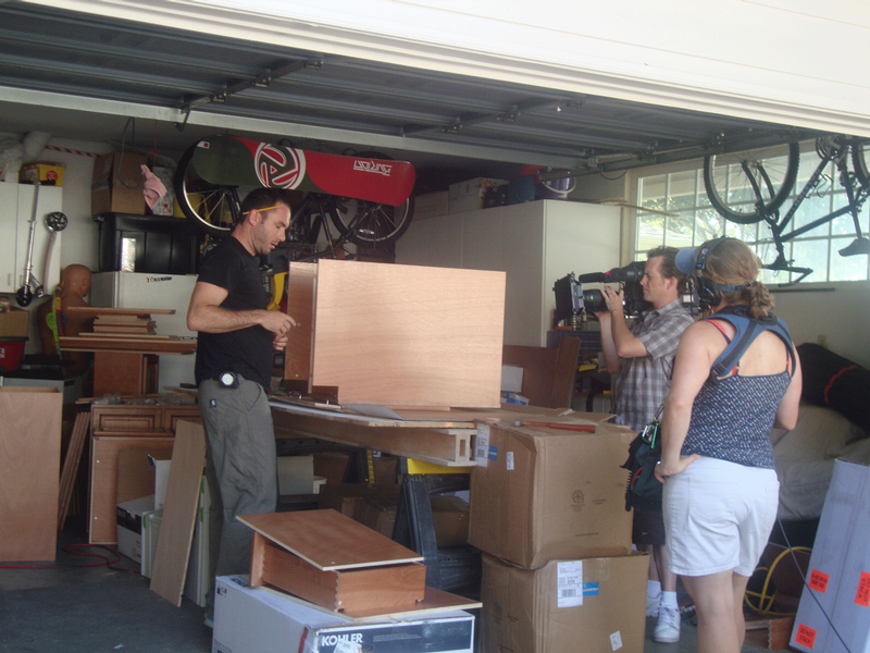 Filming the assembly of a base cabinet