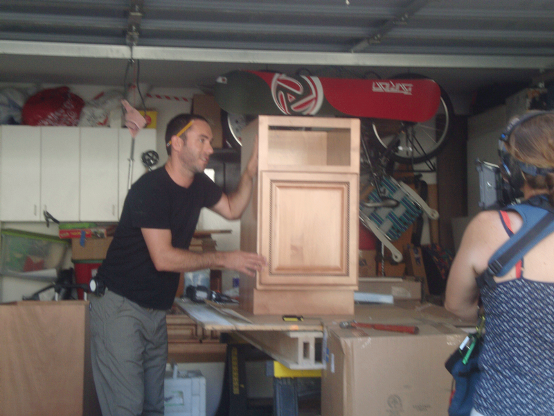 Jake completes the assembly of a base cabinet